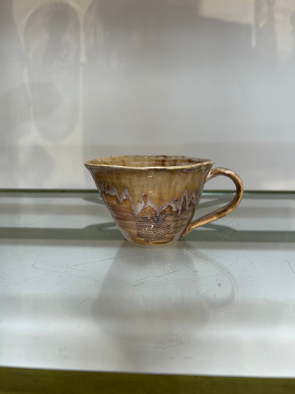 Tan coffee cup